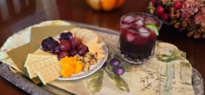 Plate of cheese and crackers with rich juice