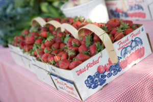 Baskets of strawberries at a farmers market