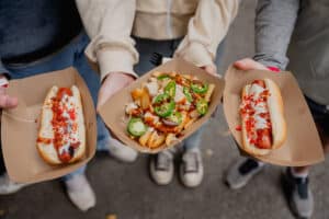Hot dogs with various toppings at festival