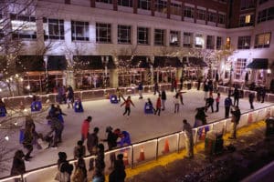 People ice skating on main street.