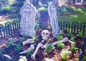 Faux graveyard with tombstones in garden