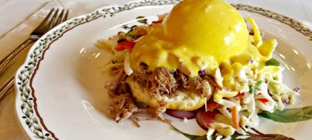 Poached egg with mustard Hollindaise on toasted buscit