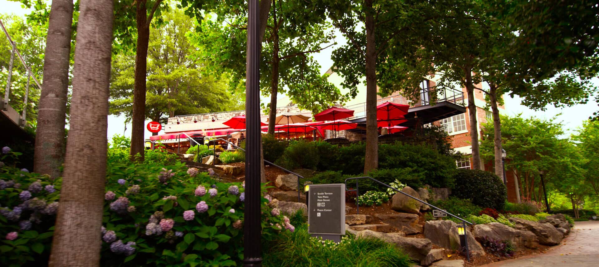 Beautiful Falls Park steps to a French restaurant.
