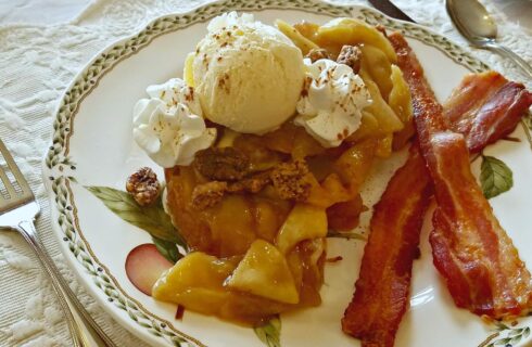 Apple Sundae stuffed French Toast with this classic breakfast with roasted apples, candied pecans, and vanilla ice cream.