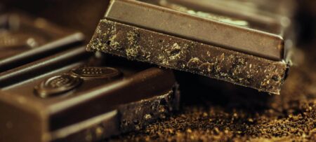 Bars of chocolate in rich background